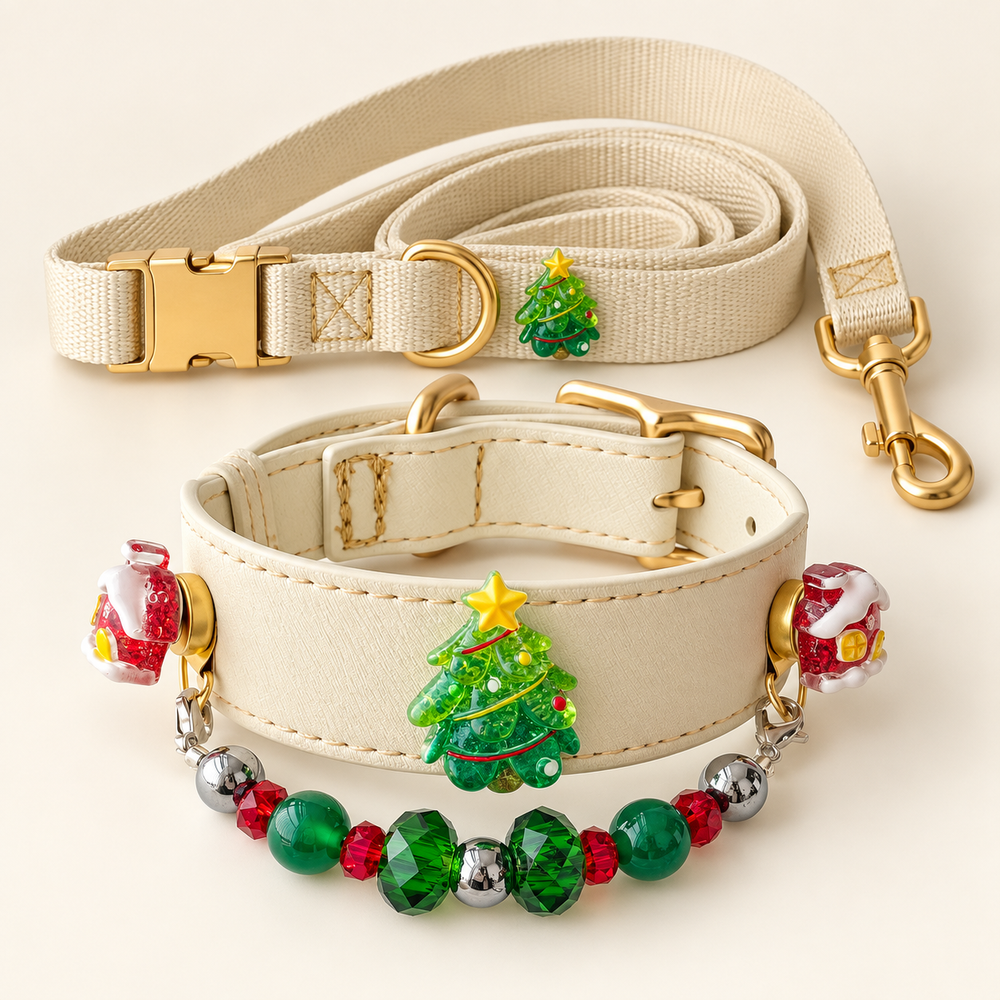 Cream Christmas tree pet collar with red house decorations, a green and red bead strand, and matching webbing leash.